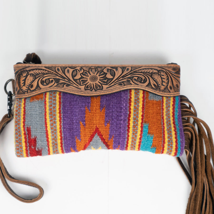Tooled leather clutch with Southwestern woven textile and fringe - Uhorse