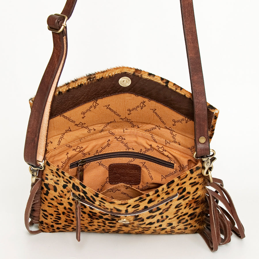 American Darling Women's Hand Tooled Floral Carved Leather Envelope with Hair-On Cowhide and Fringes