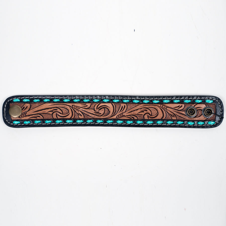 Leather wrist cuff with tooled design and turquoise studs - Uhorse