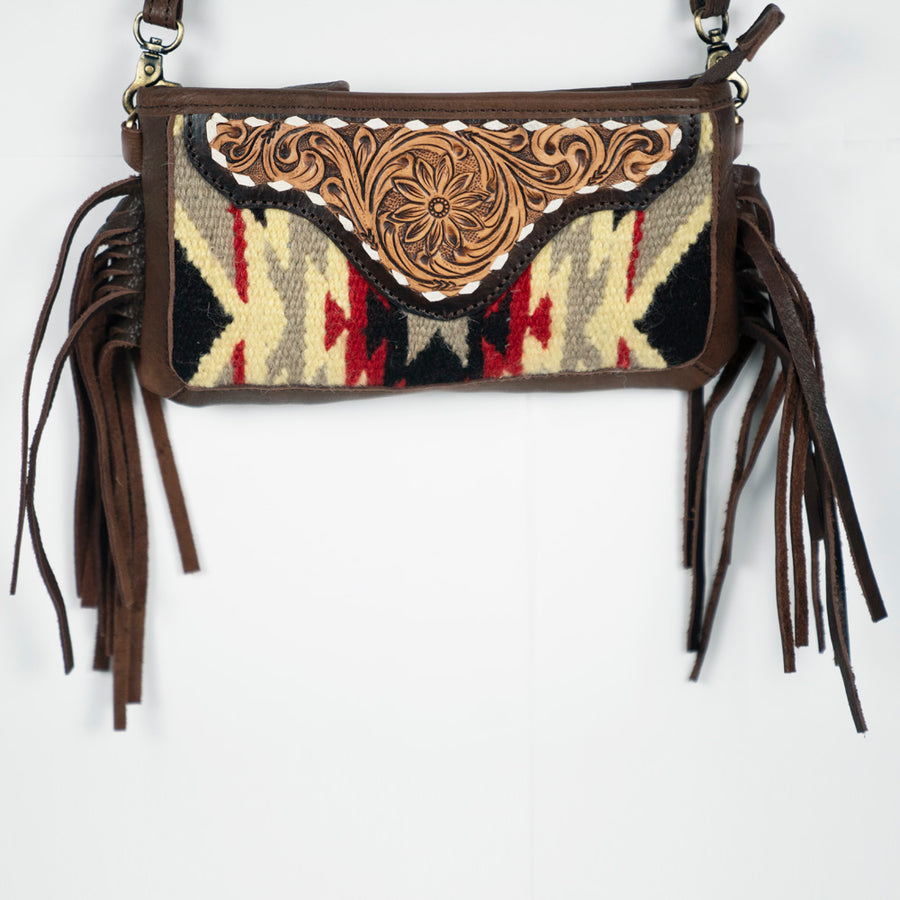 Brown leather shoulder bag with tooled flap and geometric woven panel with fringe - Uhorse