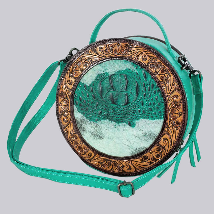Turquoise leather round crossbody bag with tooled metal frame - Uhorse