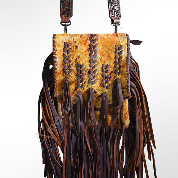 Leather crossbody bag with cowhair front and fringe - Uhorse