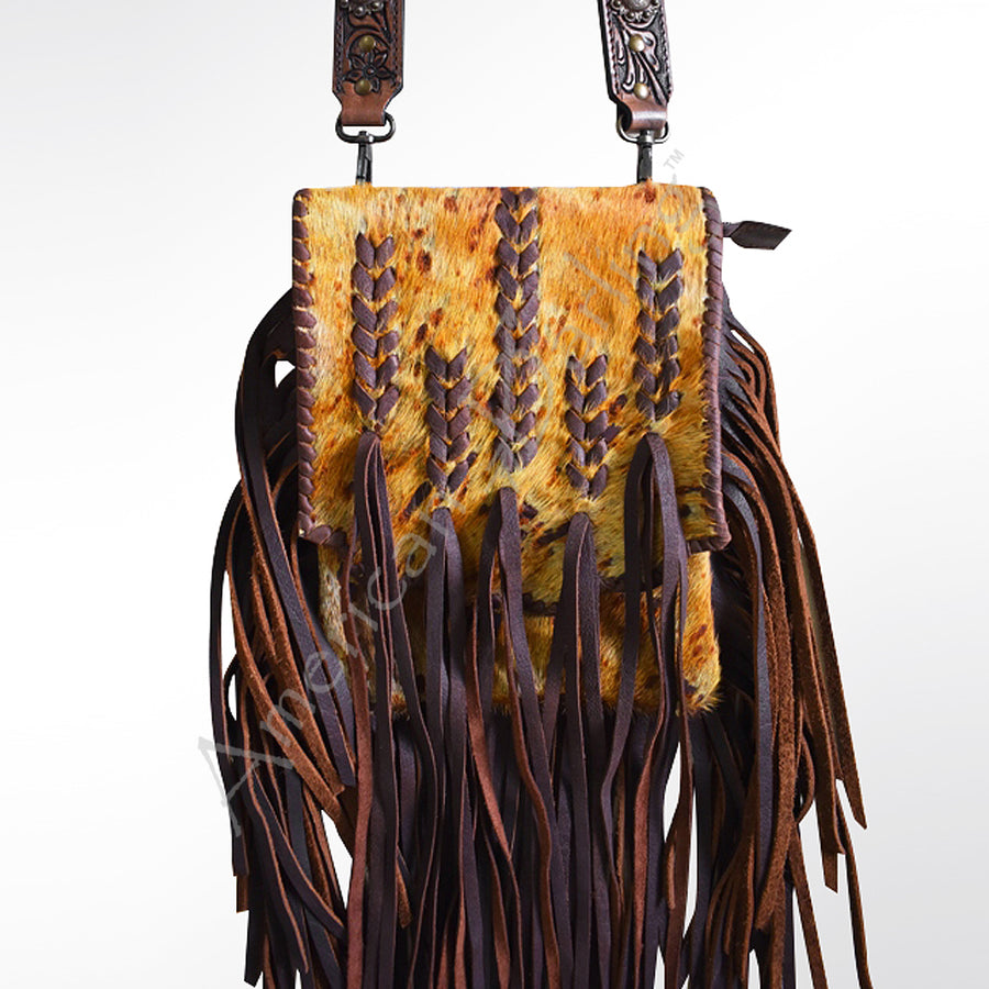 Leather crossbody bag with cowhair front and fringe - Uhorse