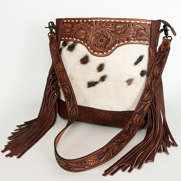 Brown leather crossbody bag with black and white cowhair panel and fringe - Uhorse