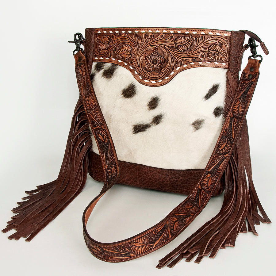 Brown leather crossbody bag with black and white cowhair panel and fringe - Uhorse