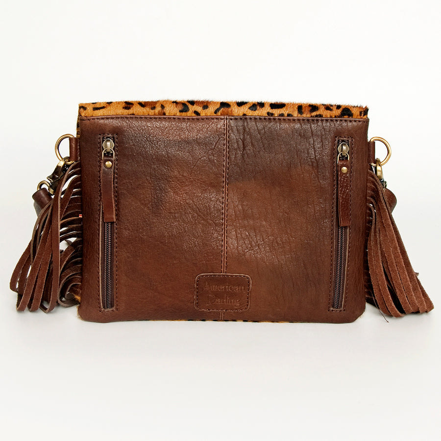 American Darling Women's Hand Tooled Floral Carved Leather Envelope with Hair-On Cowhide and Fringes