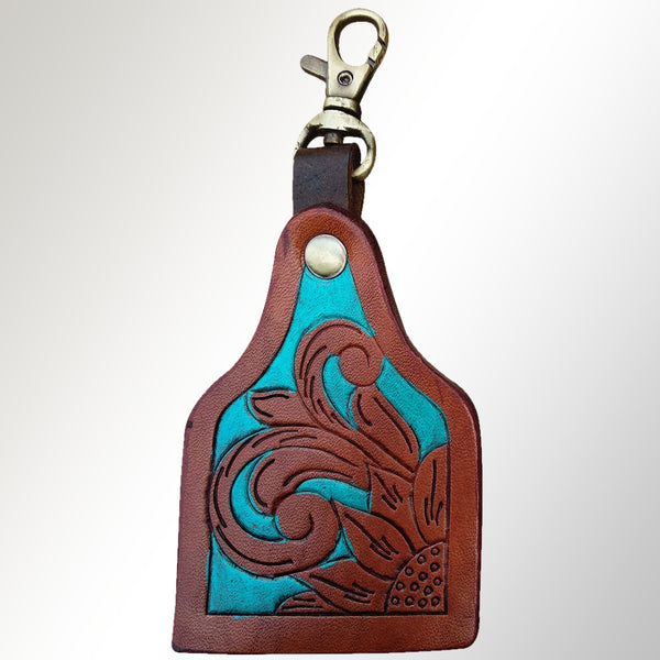 Leather keychain with turquoise and tooled design - Uhorse