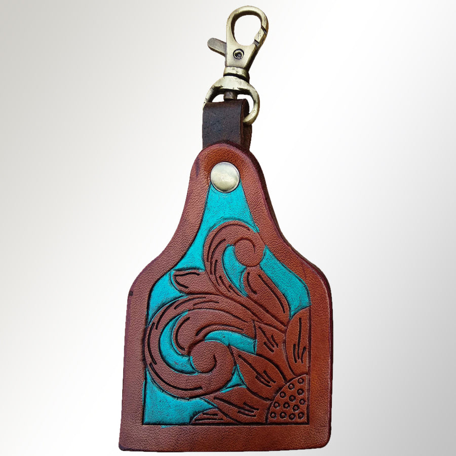 Leather keychain with turquoise and tooled design - Uhorse