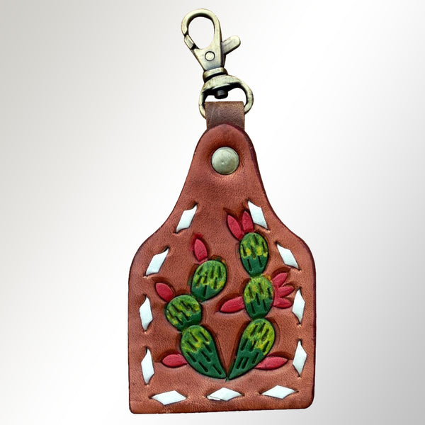 Brown leather keychain with cactus tooling and cutout details - Uhorse
