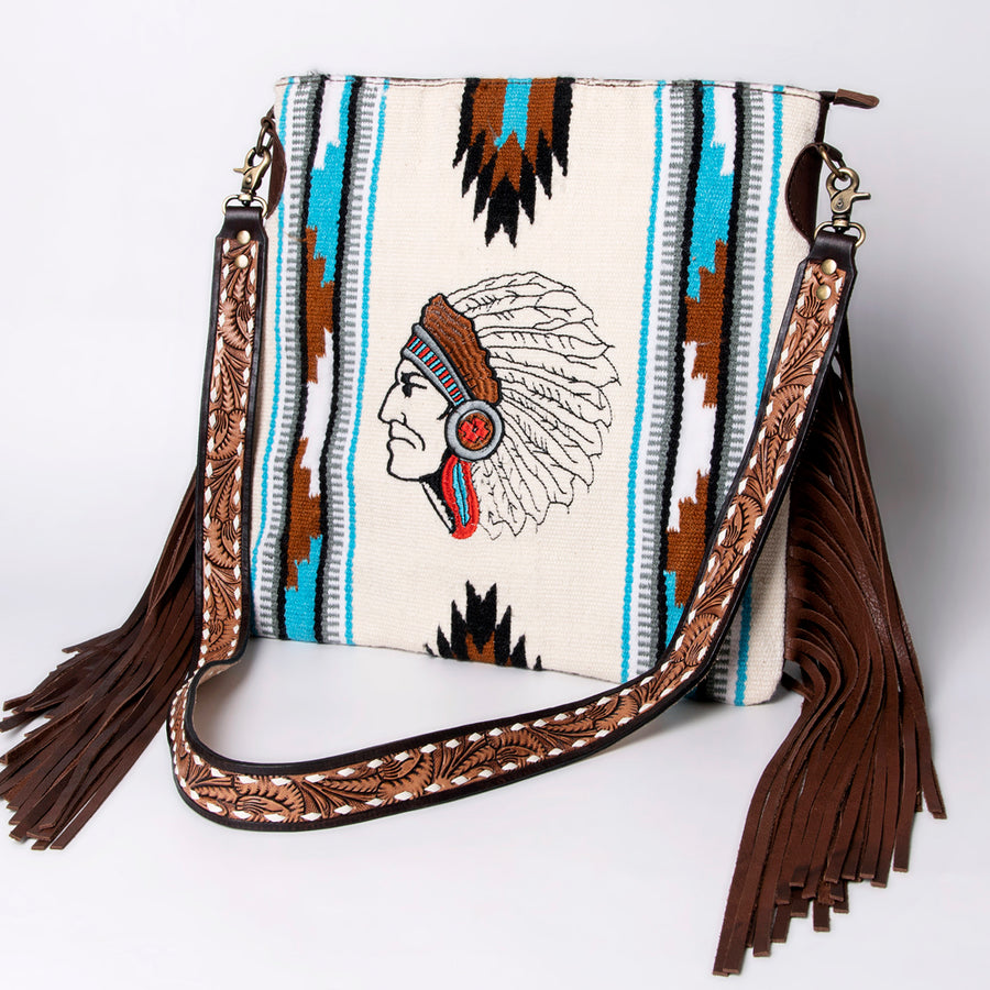 Cream canvas crossbody bag with bull skull design and fringe strap - Uhorse