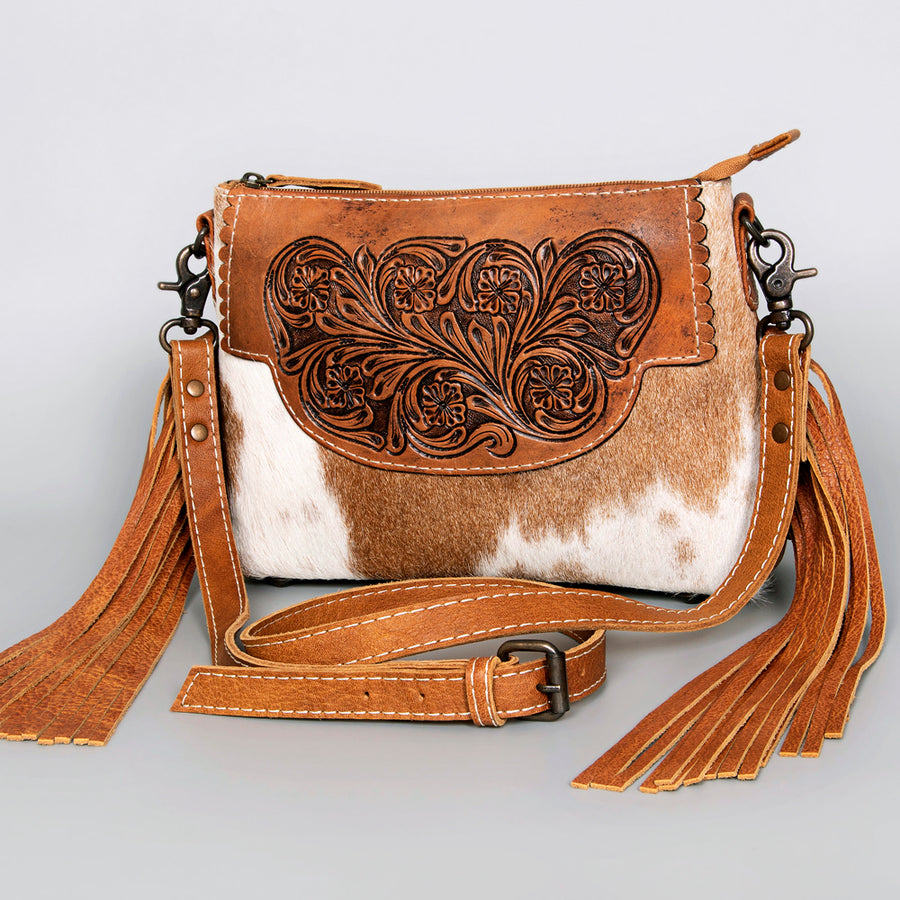 hair-on cowhide leather crossbody bag with floral tooled by American Darling
