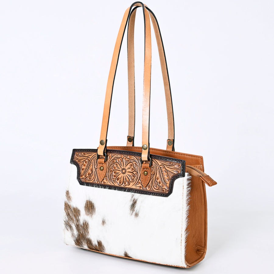handcrafted western leather tote bag with hair-on cowhide and tooled detailing