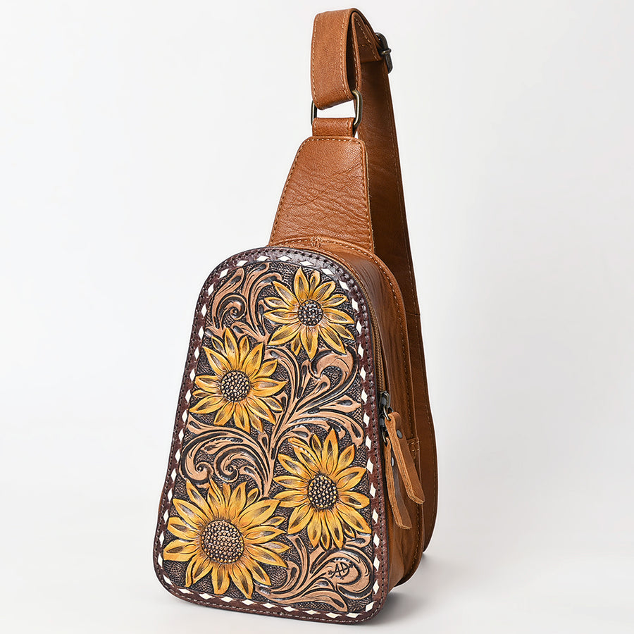 Tooled leather sling backpack with floral design - Uhorse