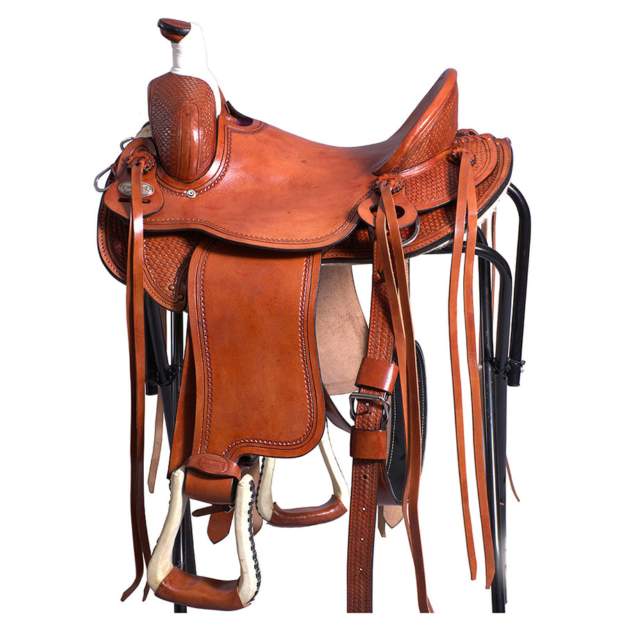 Brown leather western saddle with tooled details - Bar H Equine
