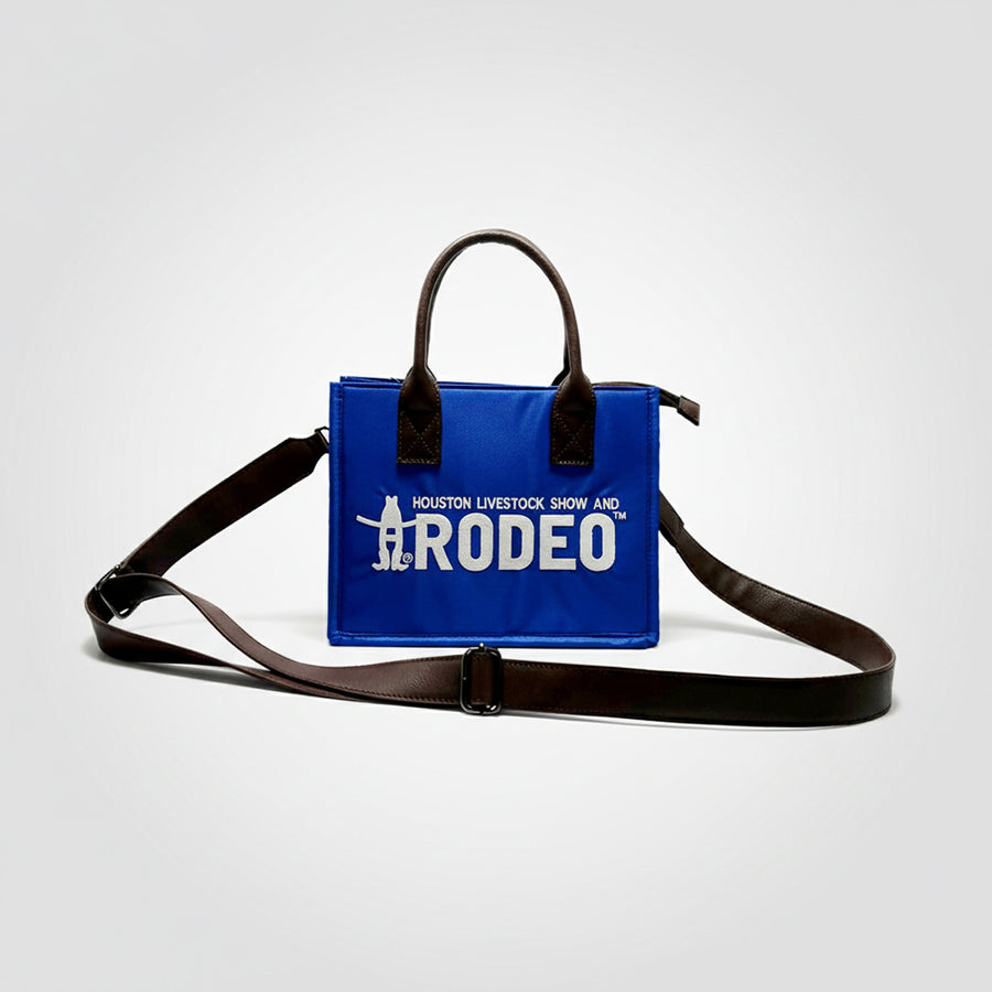 Blue canvas Houston Livestock Show and Rodeo tote bag with brown leather handles - Uhorse