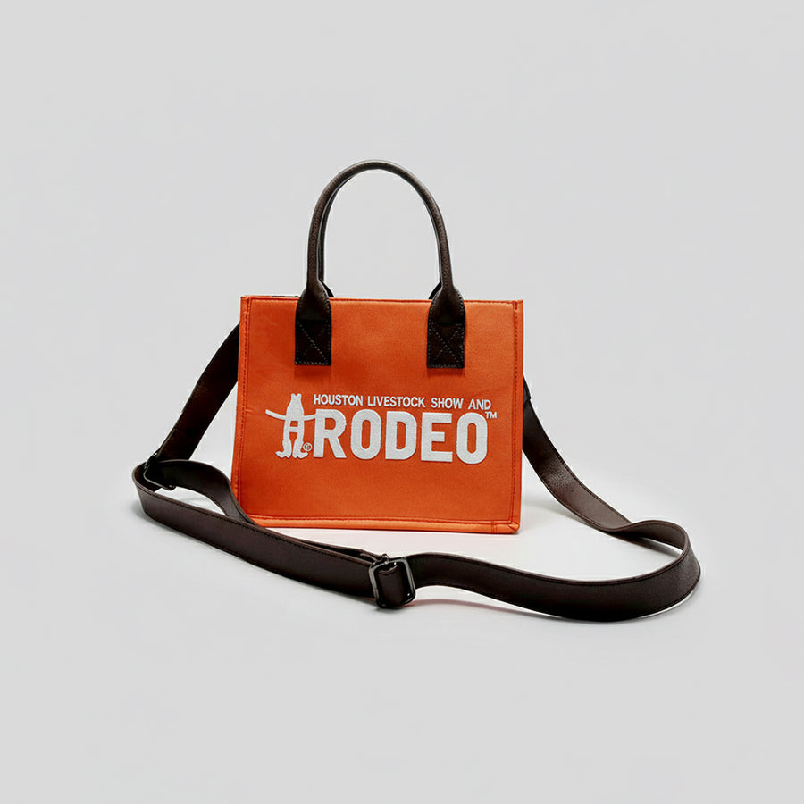 Orange canvas tote bag with black handles and shoulder strap - Uhorse