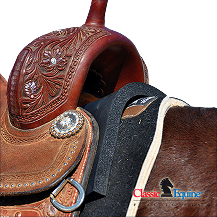 Western saddle with tooled leather and concho detail - Uhorse